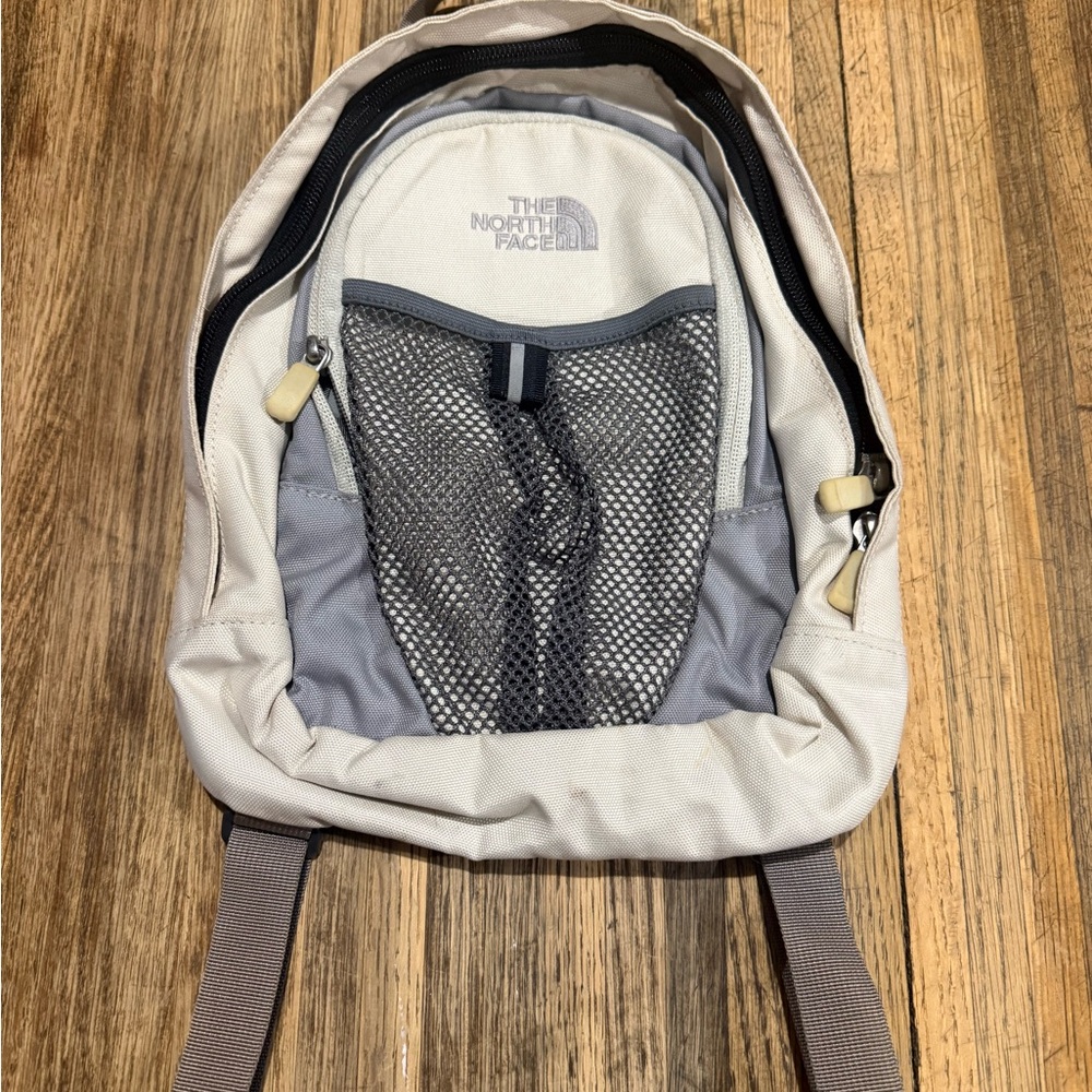 The North Face Cream and Gray Backpack